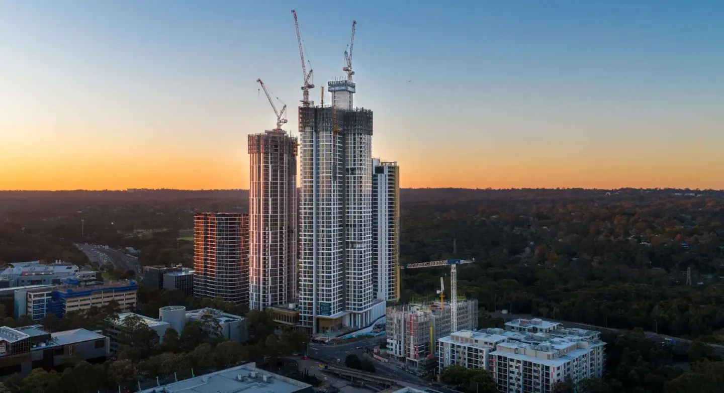 Twilight aerial of a residential development mid-construction